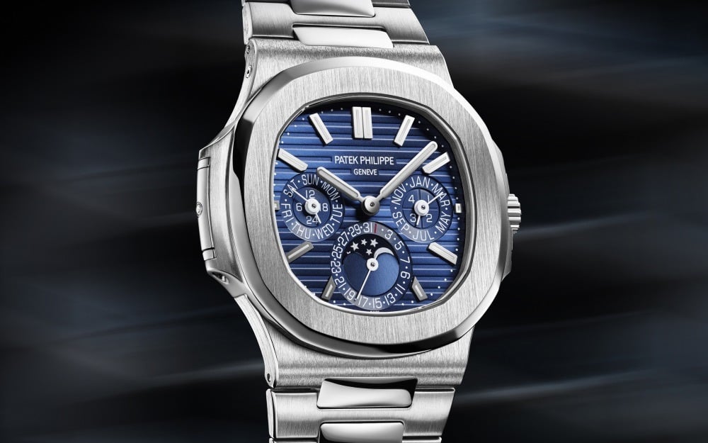 Nautilus, Reference 5740/1G-001, A white gold perpetual calendar  wristwatch with moon phases, leap year indication and bracelet, Circa 2022, Fine Watches, 2023